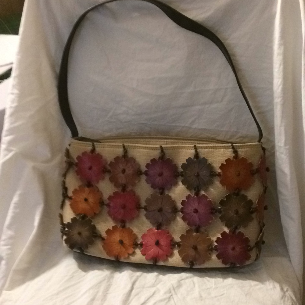 Rolf’s leather and linen purse
